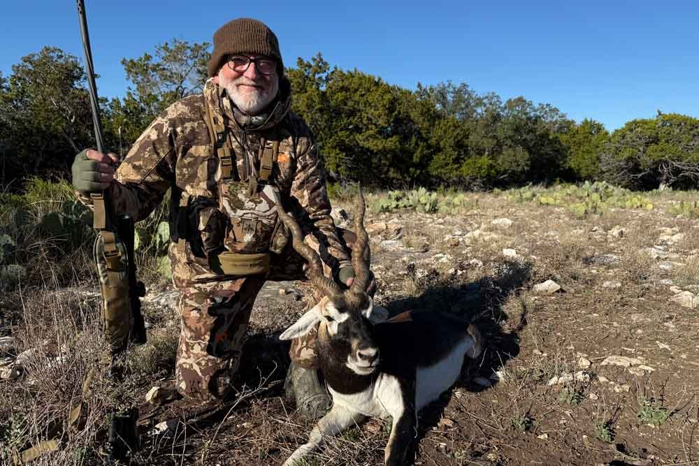 hunter with black buck antelope
